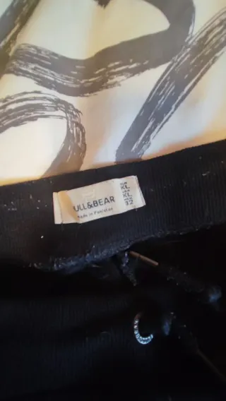 Lote de ropa con tallas y marcas variadas