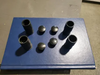 Gomas y tapones pinzas de freno.