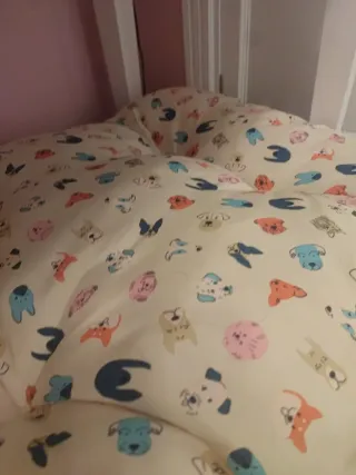Cama acolchada para perro con estampado