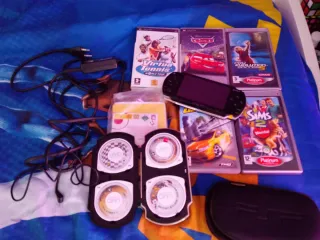 Psp con caricatore e giochi