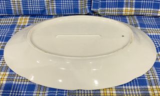 Tetera y plato antiguo de porcelana