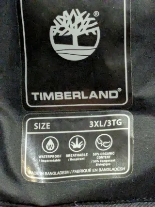 Abrigo Timberland negro plumas y capucha