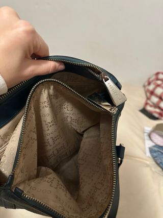 Bolso de mano color verde azulado