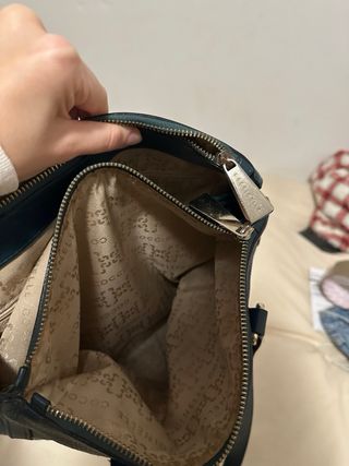 Bolso de mano color verde azulado