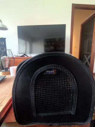 Transportín para gatos o perros pequeños.