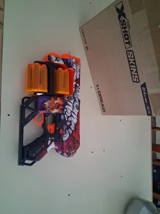 Pistola X-Shot 12 dardos