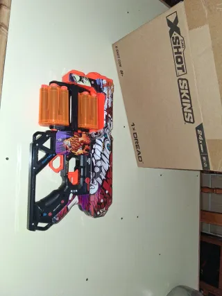 Pistola X-Shot 12 dardos