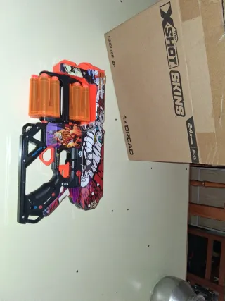 Pistola X-Shot 12 dardos