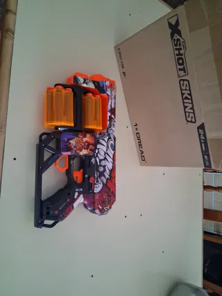 Pistola X-Shot 12 dardos