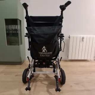 Chubasquero unisex usuario silla de ruedas