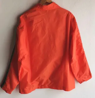 Giubbotto sportivo arancione in nylon