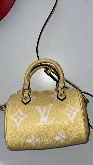 Bolsita Louis Vuitton Amarilla y Blanca