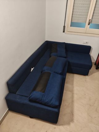 Sofá cama azul con chaiselongue