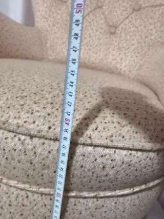 Sillón de tela beige