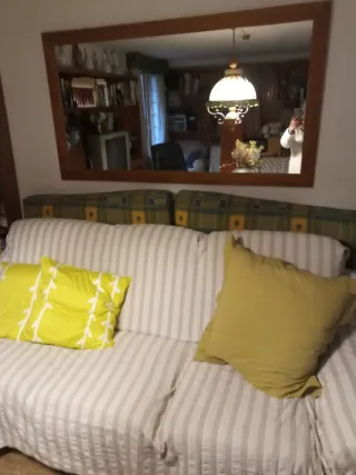 Espejo grande de madera y cristal