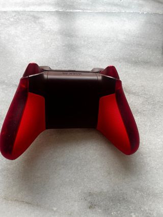 Xbox One con mando y juegos