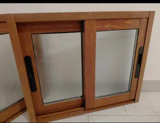 Ventanas aluminio imitación madera. 90€ cada una.