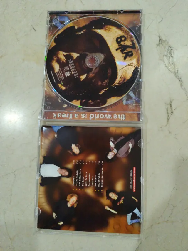 CD BAR 7 The World Is A Freak