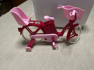 Muñecas con bici rosa