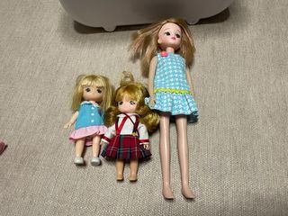 Muñecas con bici rosa