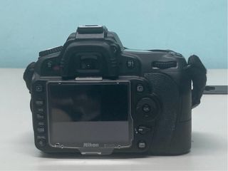 Cámara Nikon D90 con objetivo