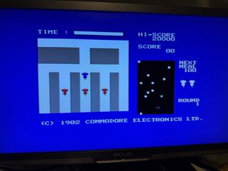 Commodore 64C con scatola e gioco