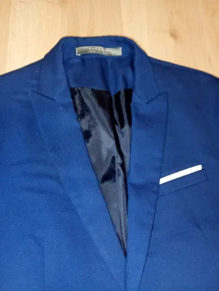 Traje juvenil azul Talla pantalón 38. Americana 40