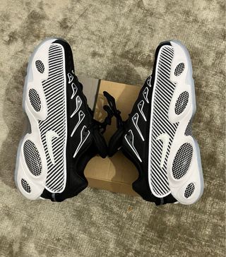 Nike Nocta Glide Scarpa Uomo Nero Bianco