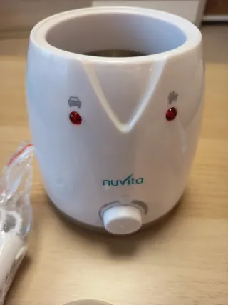 Calienta biberones NuVita Casa & Auto