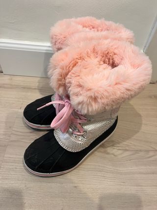 Botas de nieve apreski rosas y plateadas