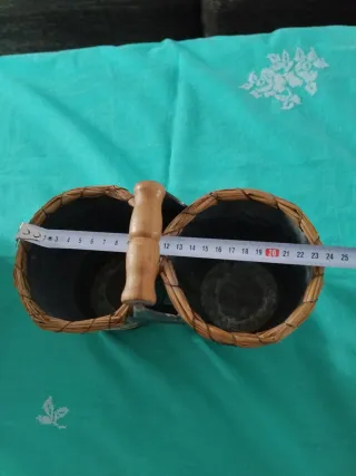 Maceteros de metal y mimbre