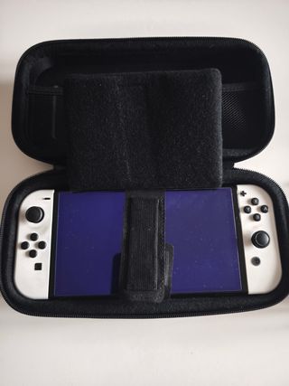 Nintendo Switch OLED + 8 Juegos + mandos y ascesor