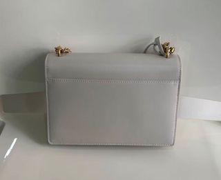 Bolso YSL piel blanco y dorado