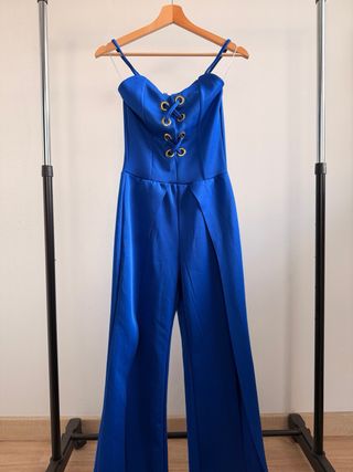 Tuta blu elegante con lacci