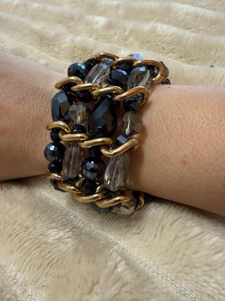 Pulsera elástica fantasía negra y dorada