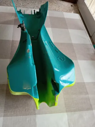 Depósito asiento y protector de escape Cota 310