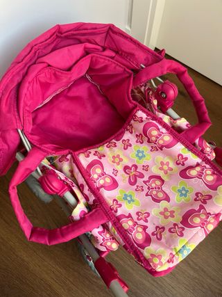 Carrito de muñecas rosa