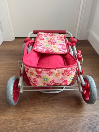 Carrito de muñecas rosa