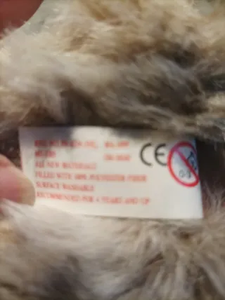 Muñeco hablador tipo Furby