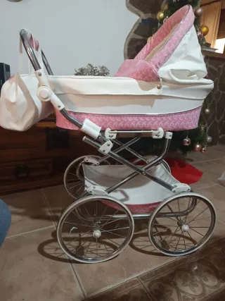 Carro de muñecas reborn rosa