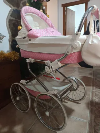 Carro de muñecas reborn rosa