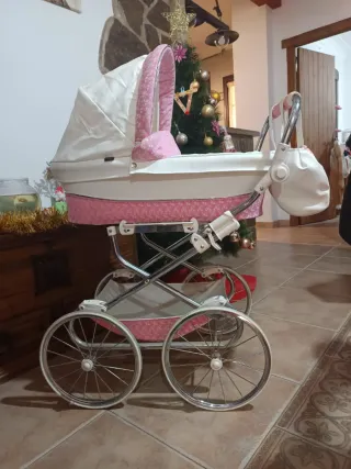 Carro de muñecas reborn rosa