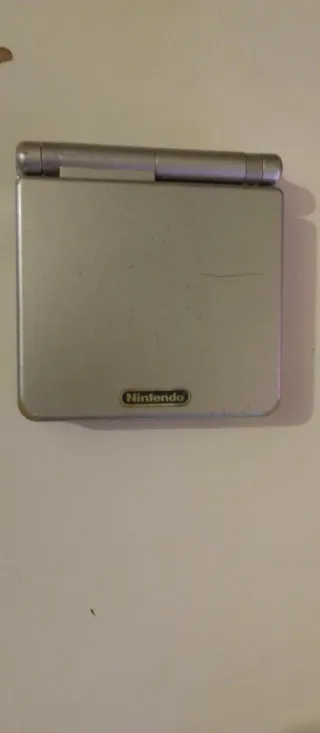 Nintendo GBA SP + 8 juegos y cargador