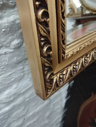 Pareja de espejos dorados antiguos