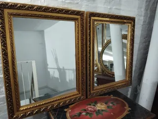 Pareja de espejos dorados antiguos