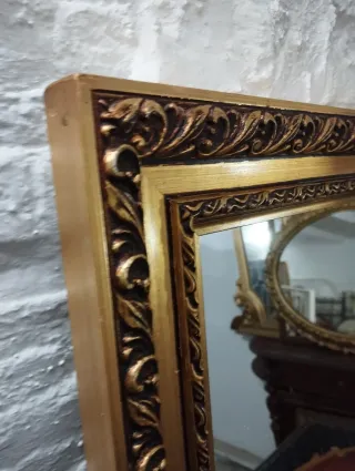 Pareja de espejos dorados antiguos