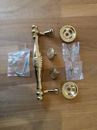 Tiradores puerta entrada  GROEL latón dorado