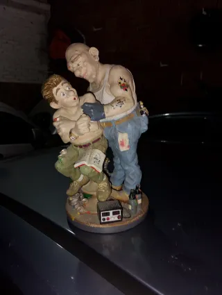 Figura Tatuador y Cliente