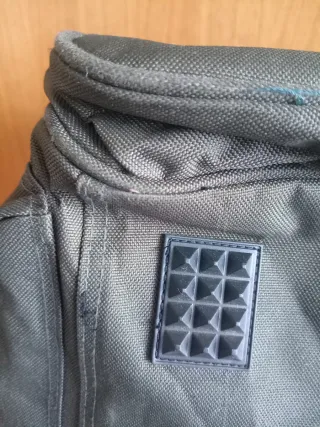 Bolsa de viaje verde y naranja