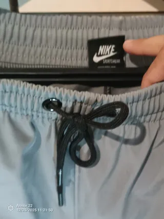 Tuta sportiva Nike grigia con cappuccio